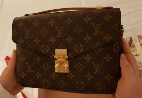 como saber que una cartera louis vuitton es original|authentic Louis Vuitton purses.